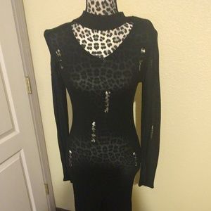 Sheer, shredded black dress